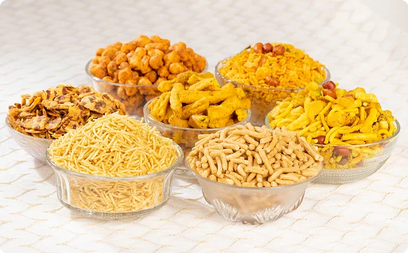 Assorted namkeen and snack products from Hanumant Gruh Udhyog